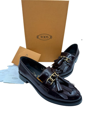 Tod’s Deep Burgundy Leather Tassel Loafers with Chain Detail – Size 39.5