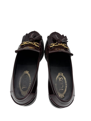 Tod’s Deep Burgundy Leather Tassel Loafers with Chain Detail – Size 39.5