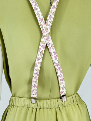 Chanel *Rare* printed suspenders with pink enamel CC logo clips — includes Chanel box