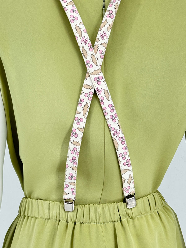 Chanel *Rare* printed suspenders with pink enamel CC logo clips — includes Chanel box