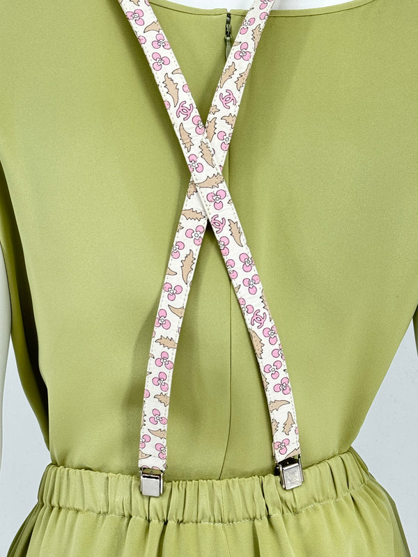 Chanel *Rare* printed suspenders with pink enamel CC logo clips — includes Chanel box