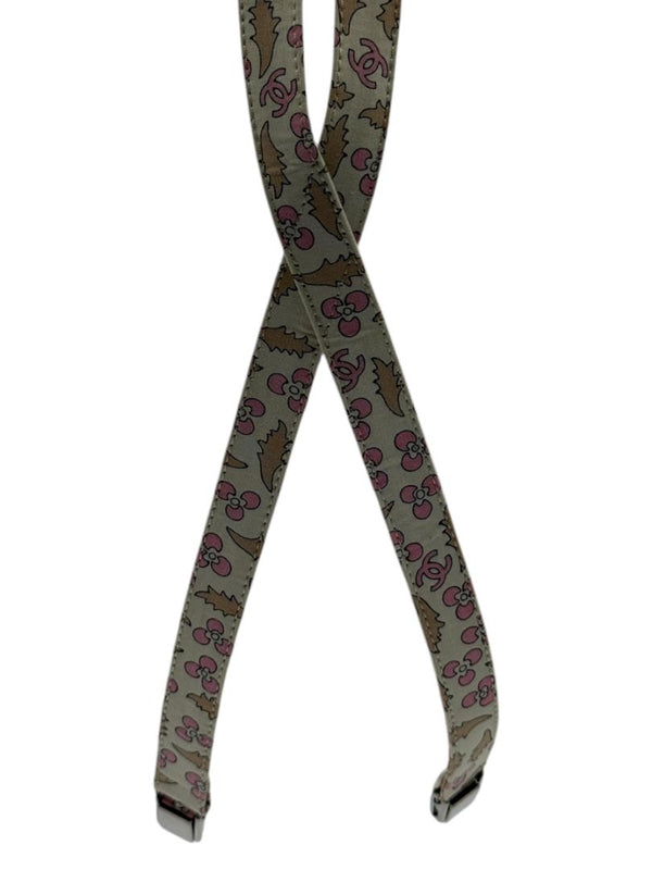 Chanel *Rare* printed suspenders with pink enamel CC logo clips — includes Chanel box