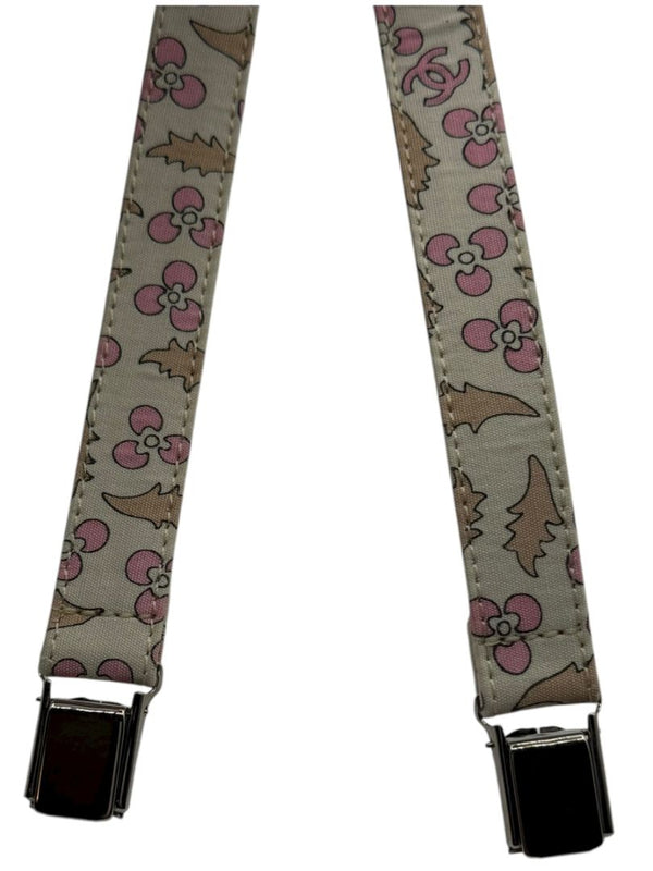 Chanel *Rare* printed suspenders with pink enamel CC logo clips — includes Chanel box