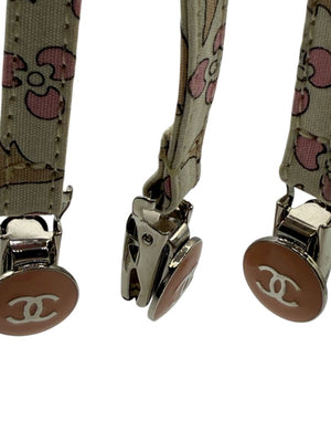 Chanel *Rare* printed suspenders with pink enamel CC logo clips — includes Chanel box